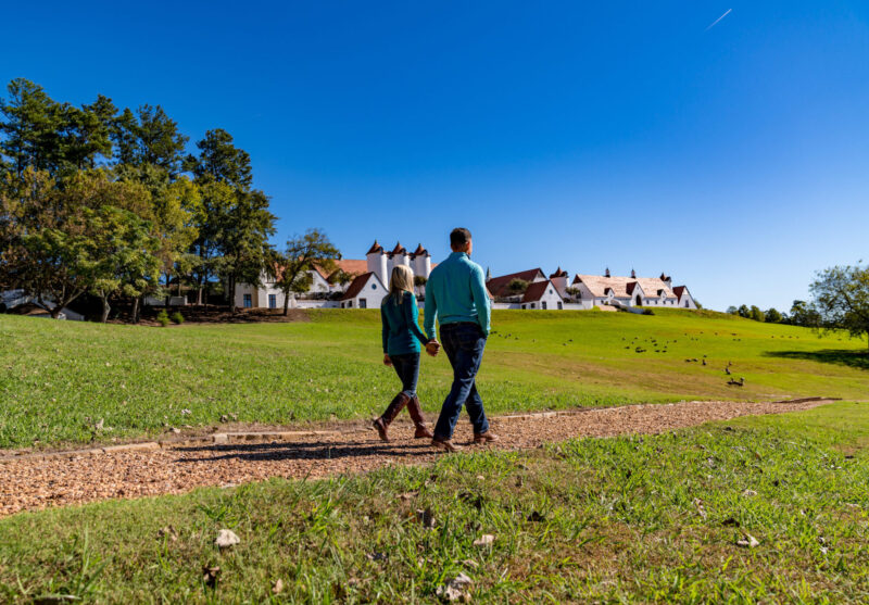 couple walking down path during a winshape marriage retreat