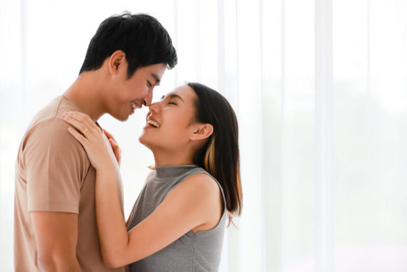 Younger married couple learning about dangerous marriage myths they're glad they don't believe, putting their marriage first and keeping it a priority