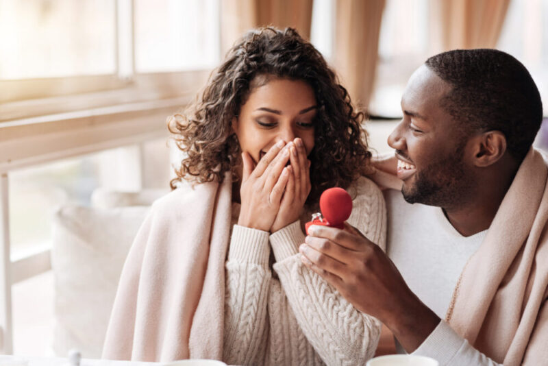 Couple who just got engaged and who is exploring the question, what is premarital counseling?