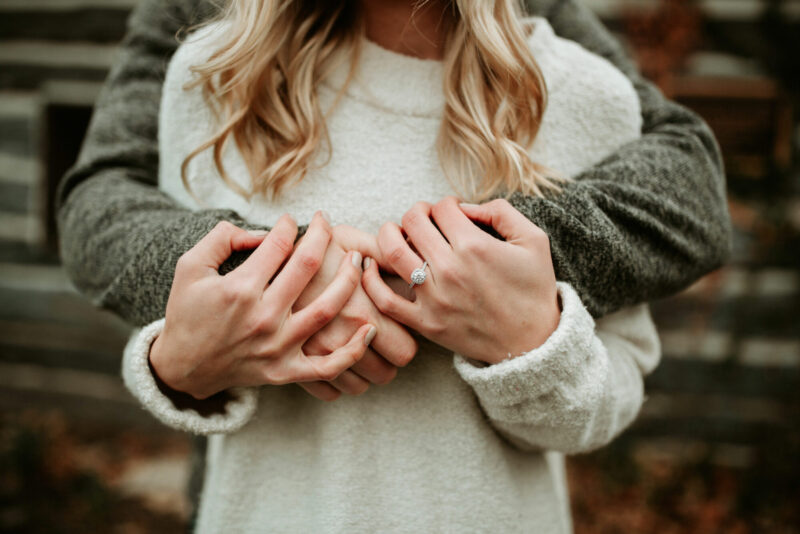 Couple who just got engaged and who is exploring the question, what is premarital counseling?