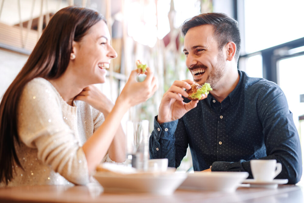 Young married couple looking for how to reconnect with your spouse, so they met up for a date during their work lunch breaks