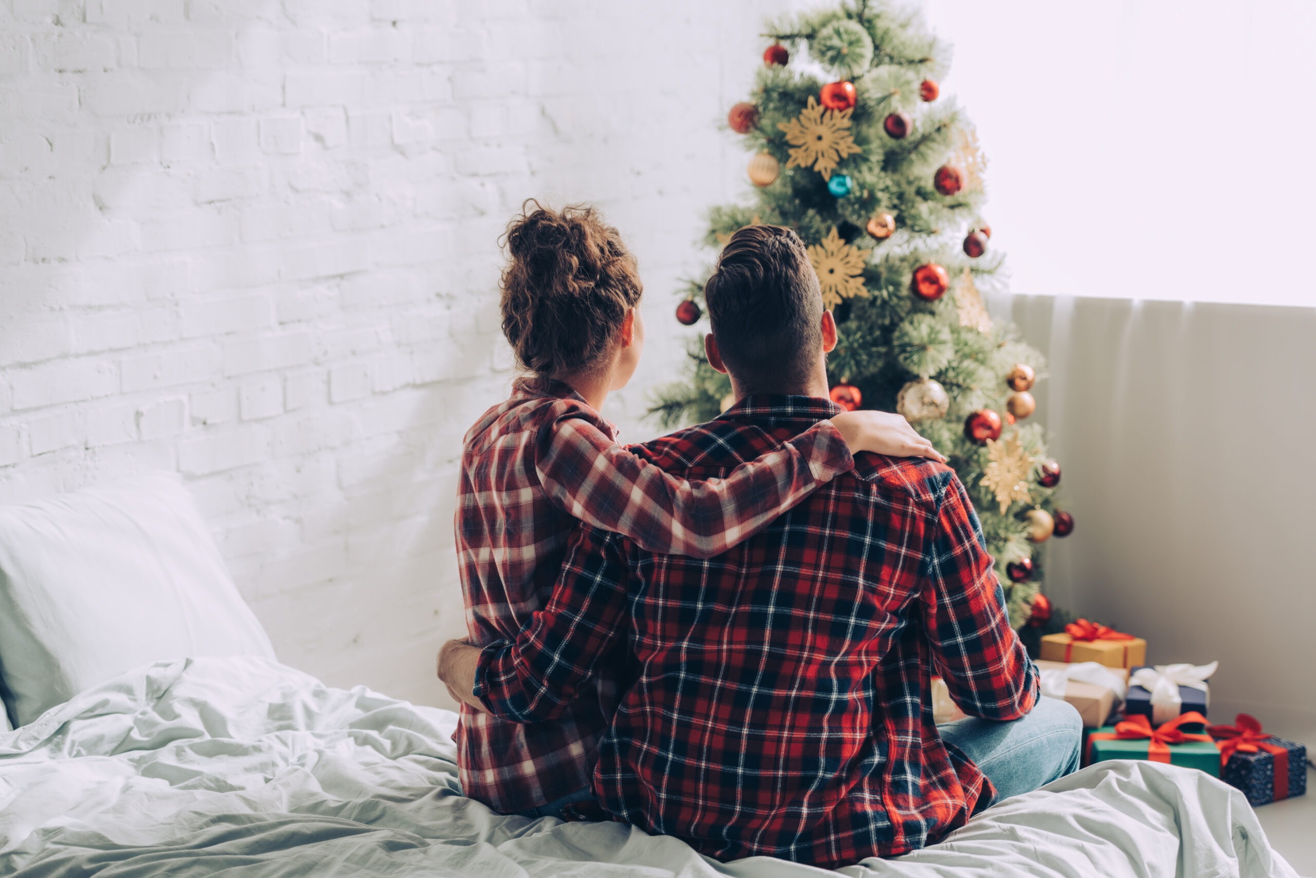 A couple working together to cope with anxiety around the holidays and how to support one another