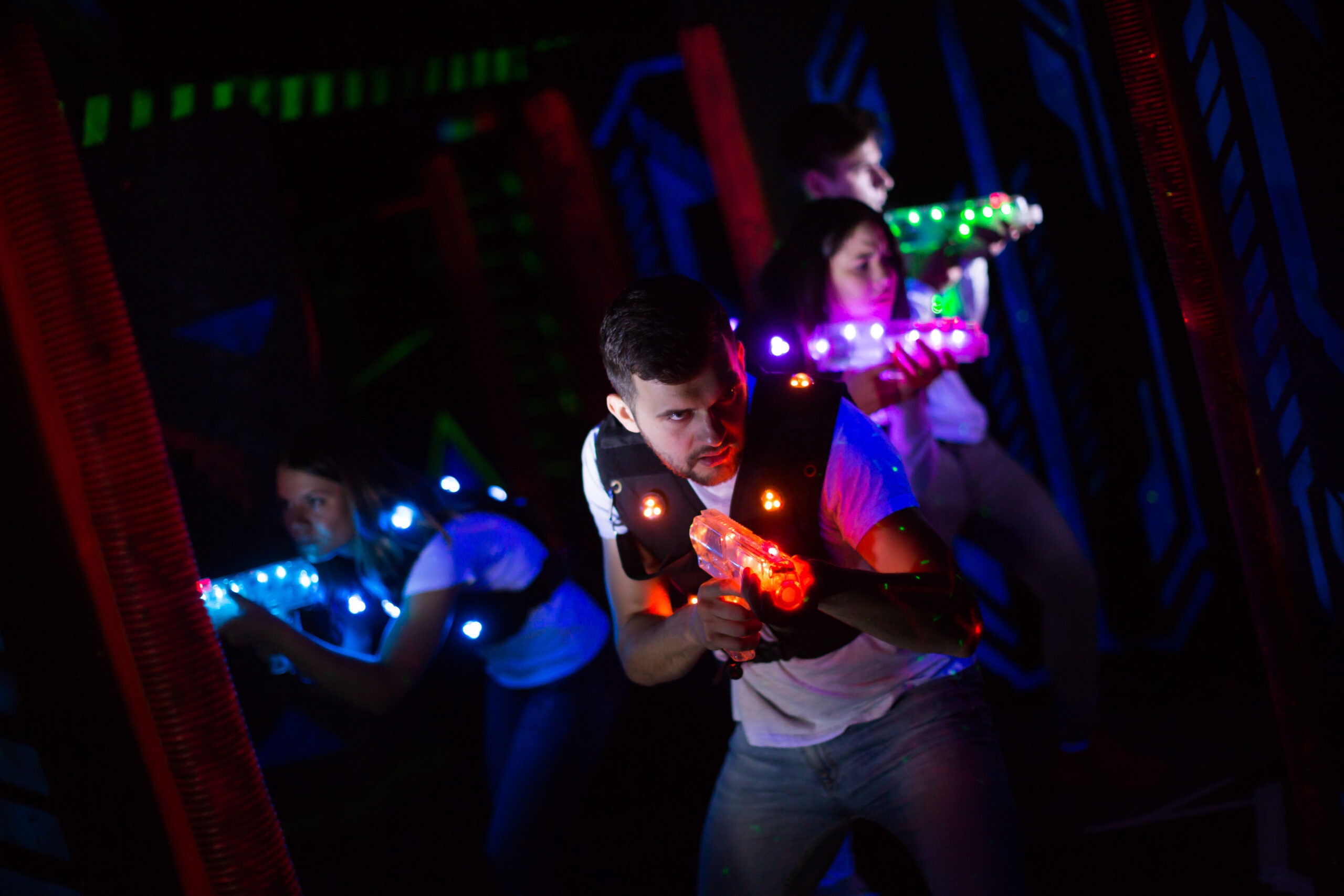 young couples double dating playing laser tag one of our fun active date ideas