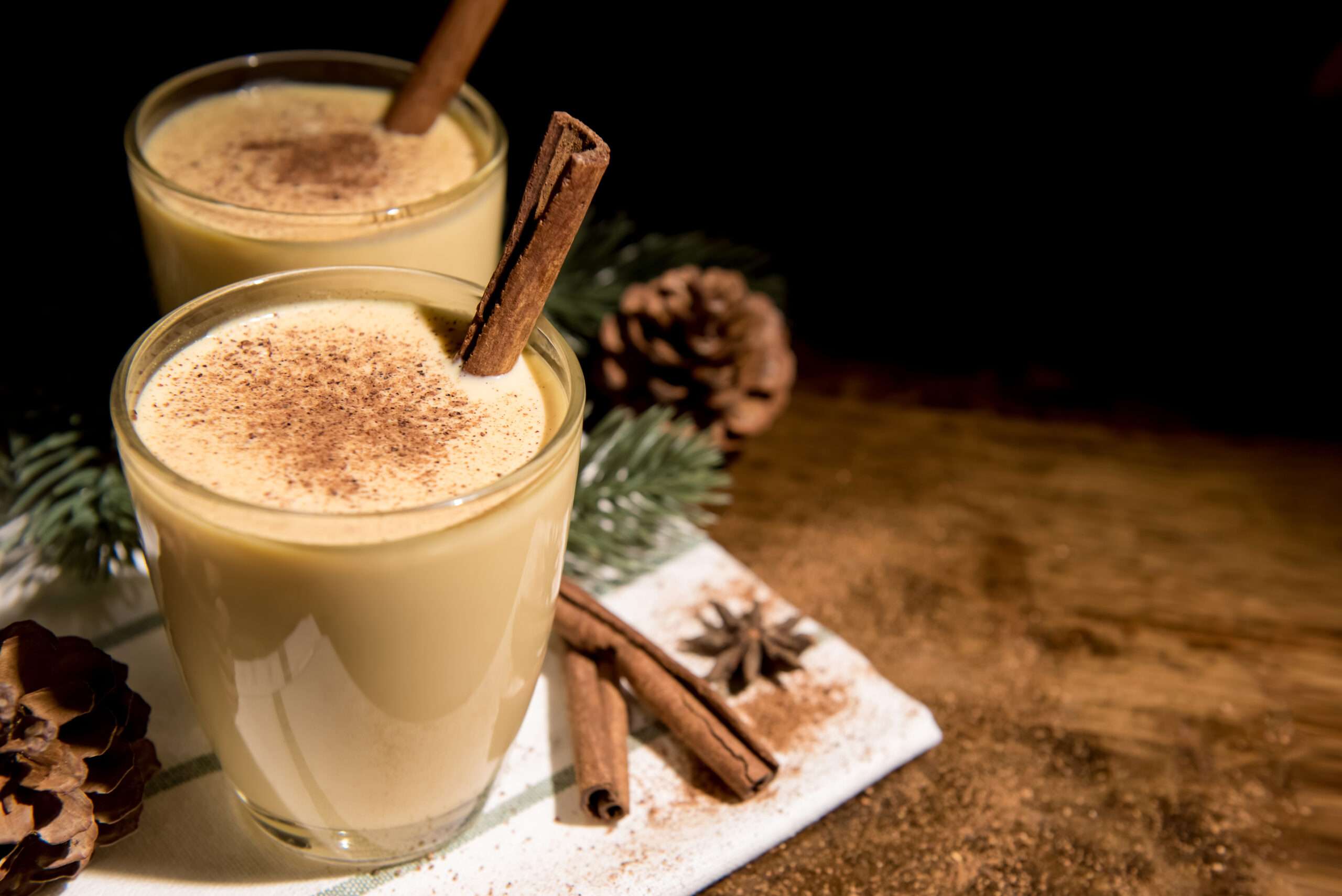 Two glasses of homemade eggnog, making homemade eggnog is a Christmas date idea