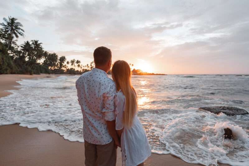 a young married couple on their honeymoon asking, how long does the honeymoon phase last